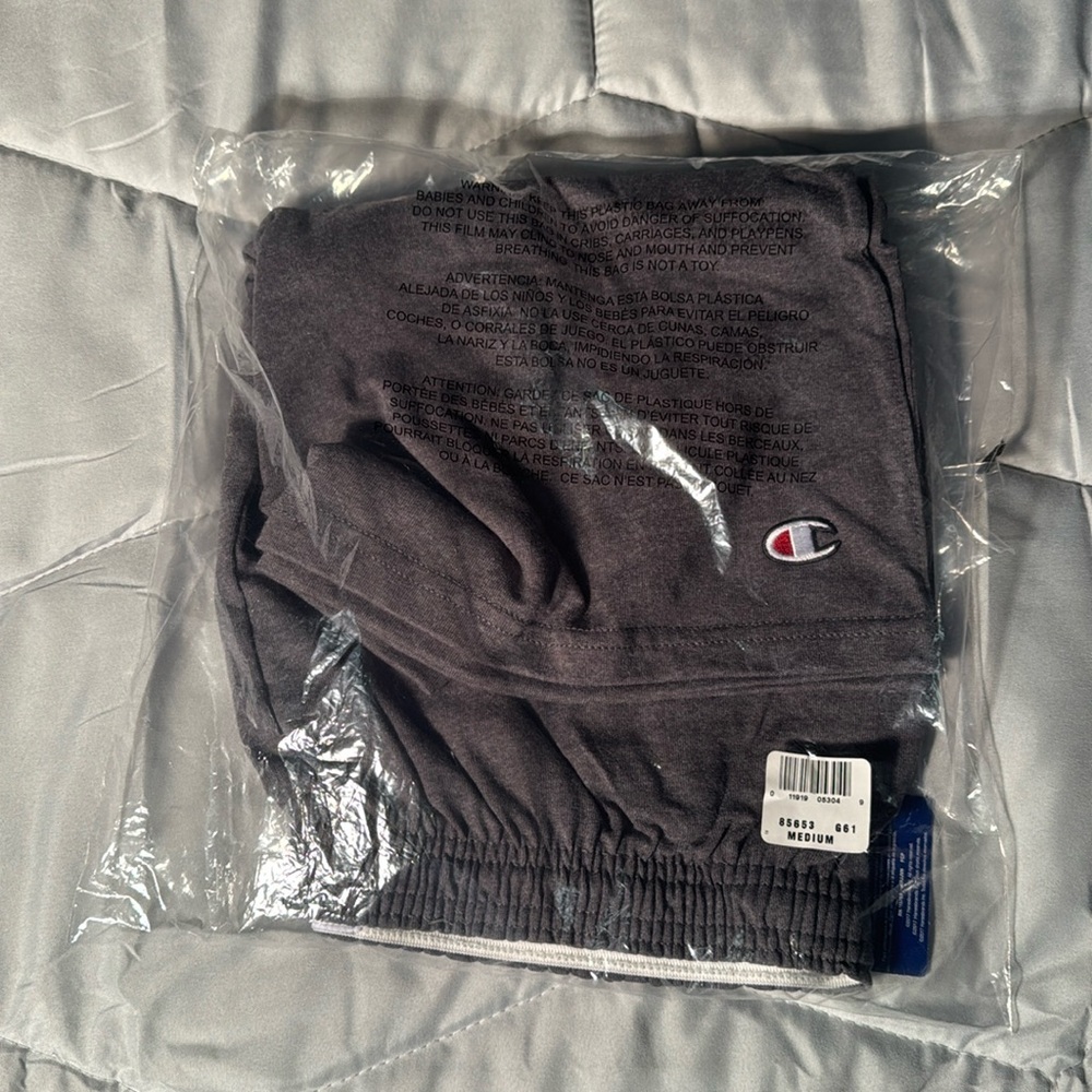 Champion brand men’s shorts, Brand new, still in package, size Medium